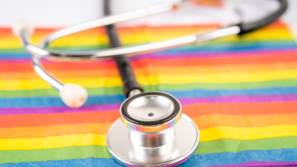 stethoscope on top of gay pride flag