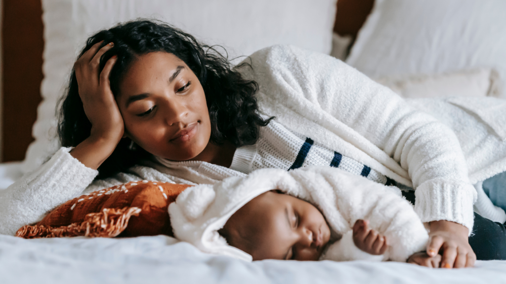 mom and baby in bed together